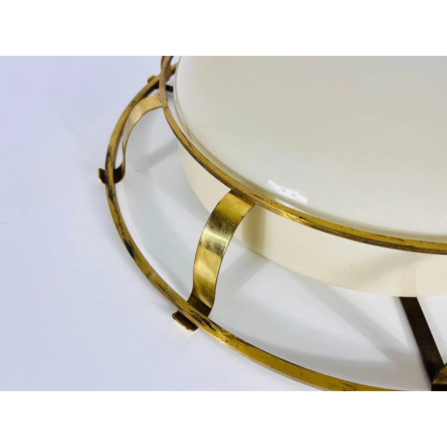 This exquisite Italian ceiling lamp from the 1960s epitomizes the elegance and innovation of mid-century modern design....