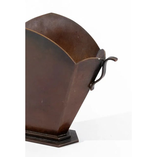 A sculptural bronze vase stamped Holder Fridericias, this compact 5.5-inch vessel showcases the minimalist elegance of...