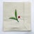 Vintage set of four linen cocktail napkins. Each is embroidered with bright red berries and green leaves. A wonderful...