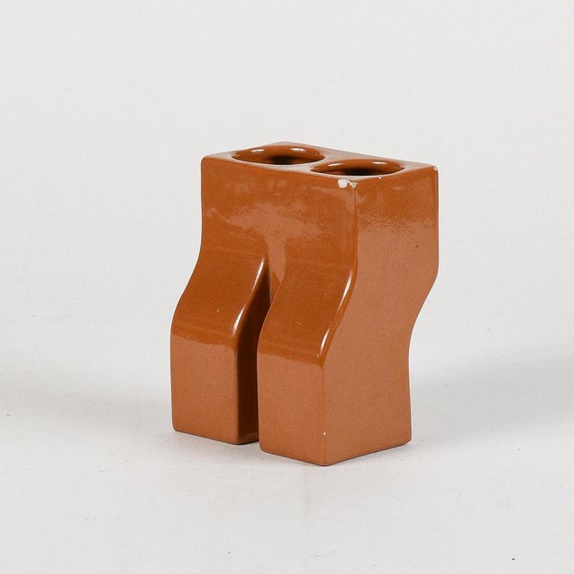 Two-hole ceramic vase signed il picchio italy made in the 1970s has signs of time and parts a little damaged as evidenced...