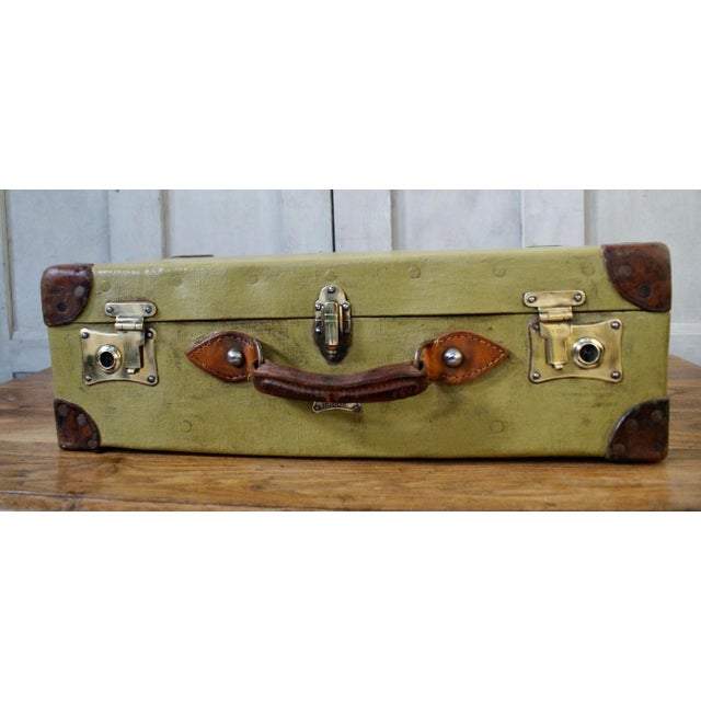 An Original Pukka Military Demob Case. Made from Canvas with leather corners and handle and original brass locks. The...