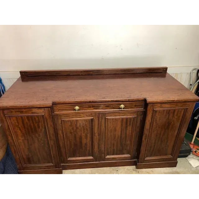 Solid mahogany English style credenza or sideboard with plenty of storage space. Interior shelving also solid mahogany...