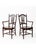 Pair of coordinating solid cherry dining armchairs by Tom Seely Furniture, reflecting the company’s tradition of finely...