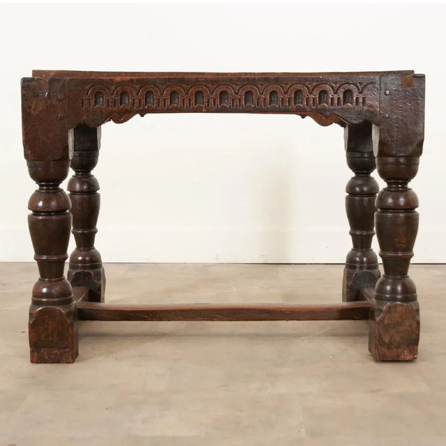 A robust, solid oak extending dining table hand-crafted in 17th century France circa 1680. Gnarled knots, beautiful grain,...