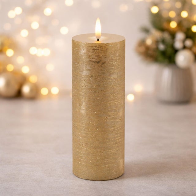 Create a warm and inviting glow in your home with this Metallic FIA Wick LED Candle set. Designed with a realistic wax...