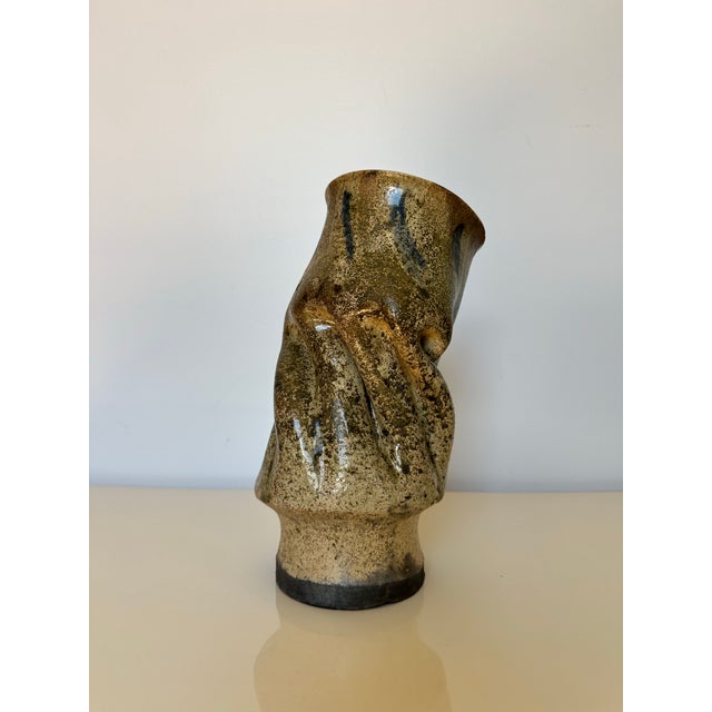 Solid stunning piece. Looks like it was hugged in the making and I just love that. Would be cute with flowers but stands...