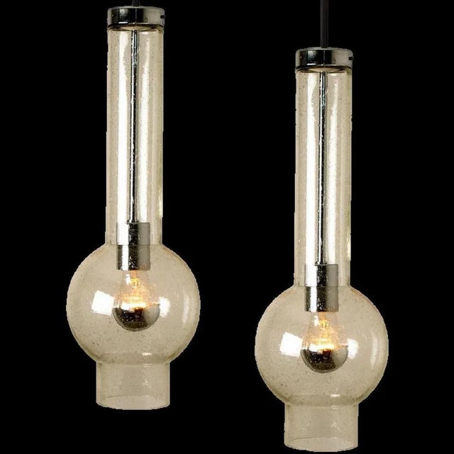 1 of the 7 f original 1970s tubular light produced in Germany by Staf, 1970 Germany. High quality glass lights with hand...