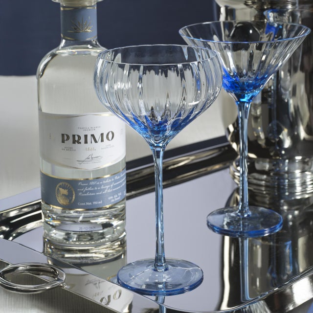 Crafted of beautifully textured glass, the colored glass set features a streamlined design with a pop of color. Set a...