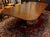 Circa 1830 Regency-William IV double pedestal banquet table with two leaves, English. Finest timbers throughout. Note the...