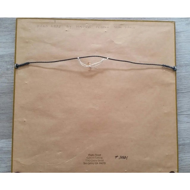 Graphic and bold this vintage Hmong embroidery panel is finished in its original golden frame and glass. Wired for hanging...