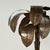 Chic mid century Italian banana tree sculpture crafted in brass in a bold stylized form with removable palms set in a...