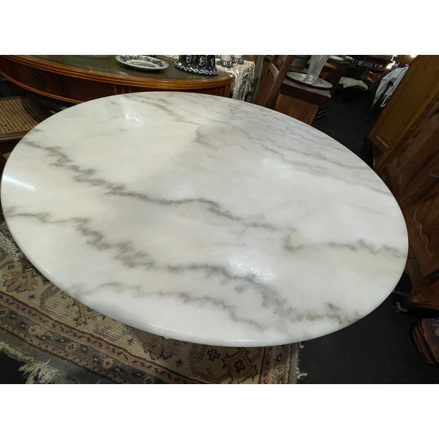Marble table in the Parisian bistro style Diameter 90 cm Cast iron base