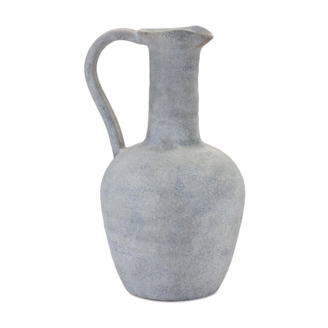 Bring rustic elegance into your home with this 12" Grey Pitcher Vase. Made of durable polyresin with a distressed cement-...