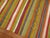 20th century Turkish Kilim with a striped design in jolly rancher tones.