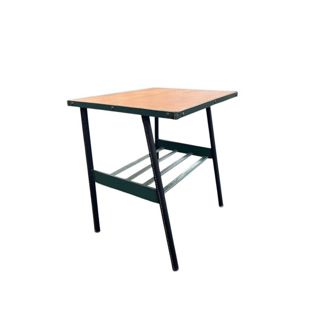 Stitched Side Table by Jacques Adnet, 1950, in Good conditions. Designed 1950 to 1959 This piece has an attribution mark,...
