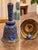 Beautiful antique metal hand bell featuring vibrant cobalt blue enamel and intricate raised designs with an Asian-inspired...