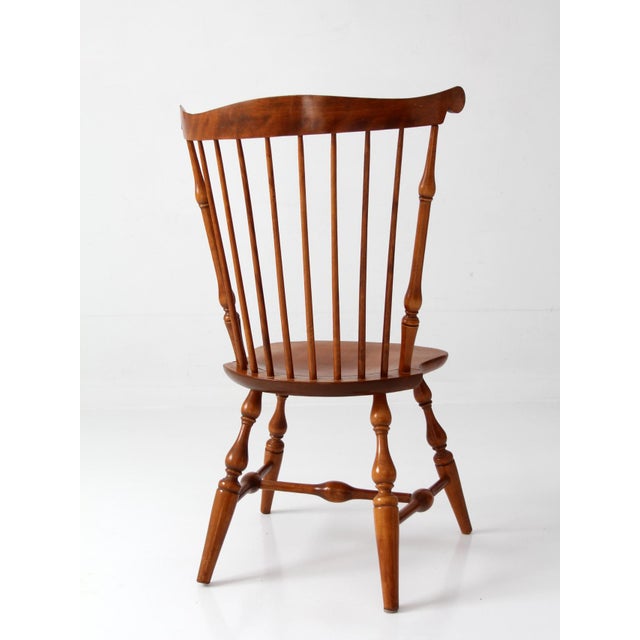 This authentic mid-century Nichols & Stone Windsor chair showcases the timeless craftsmanship and elegant simplicity the...