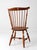 This authentic mid-century Nichols & Stone Windsor chair showcases the timeless craftsmanship and elegant simplicity the...