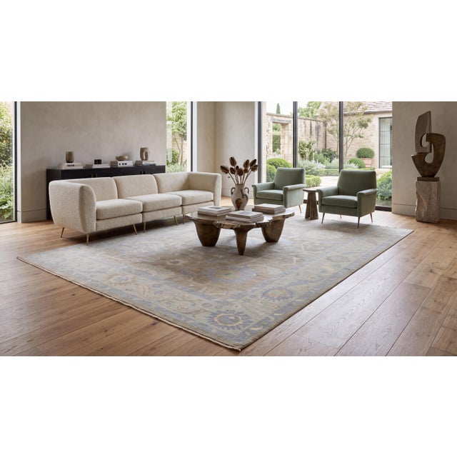 Elevate your space with this exquisite Modern Oushak style area rug, hand-knotted from premium wool. Featuring a...