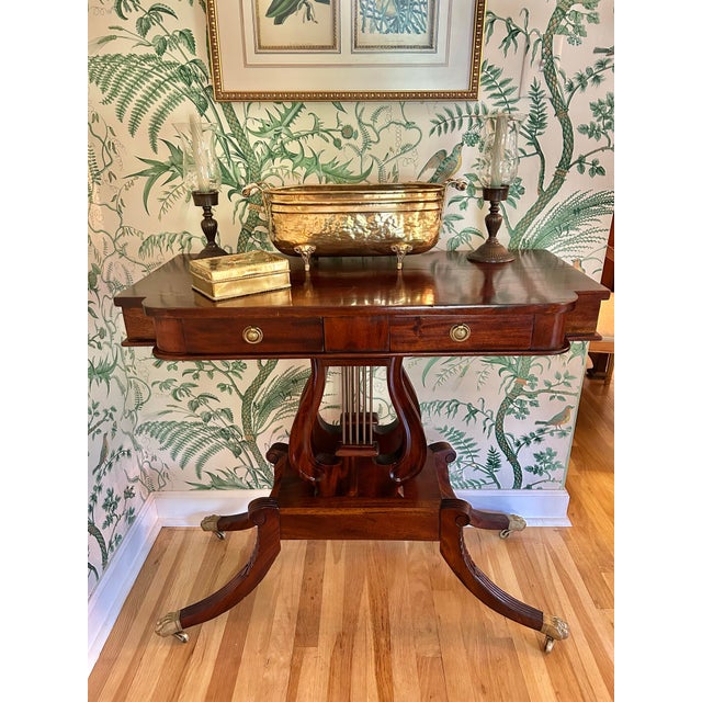 Perfect for the smaller entry or hallway, this Victorian mahogany console table has so many features. The top has 2...