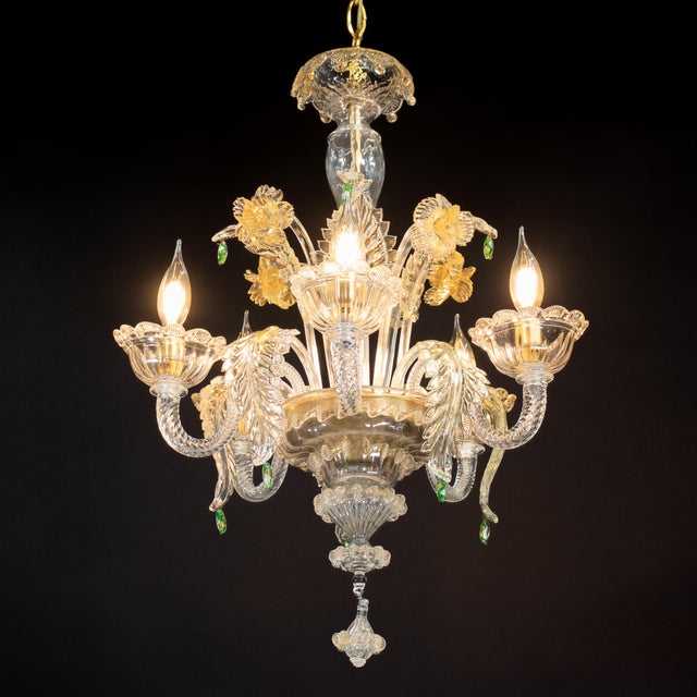 This gold‑infused, hand‑blown cristallo Murano chandelier exemplifies Venetian artistry at its finest. The piece features...