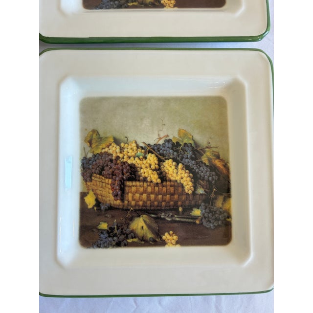 A beautifully coordinated set of four vintage Brunelli Designs square plates featuring classic fruit still life imagery,...