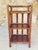 Vintage, bamboo and rattan, 3-tiered floor shelf, circa 1960's. piece has three shelves made of a dark-brown colored wood,...