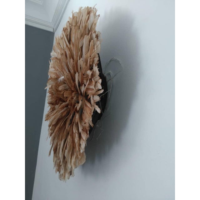 Juju hat beige of 27" (70 cm). Juju hat made with natural feathers and rattan. Juju hat woven and handcrafted. Beautiful...
