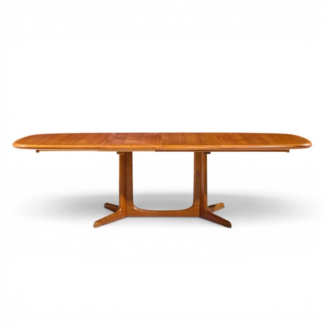 Rasmus Mid Century Danish Teak Expanding Dining Table with 2 Leaves This table measures: 63.75 wide x 41.5 deep x 28.25...