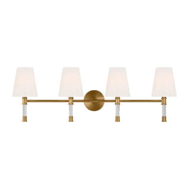 Slender curved, tapered arms form an elegant, dynamic silhouette . In the Hanover three-light wall vanity, lucite arms...