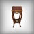 An exceptional piece of furniture, this stained sycamore pedestal table is distinguished by its exquisitely delicate...