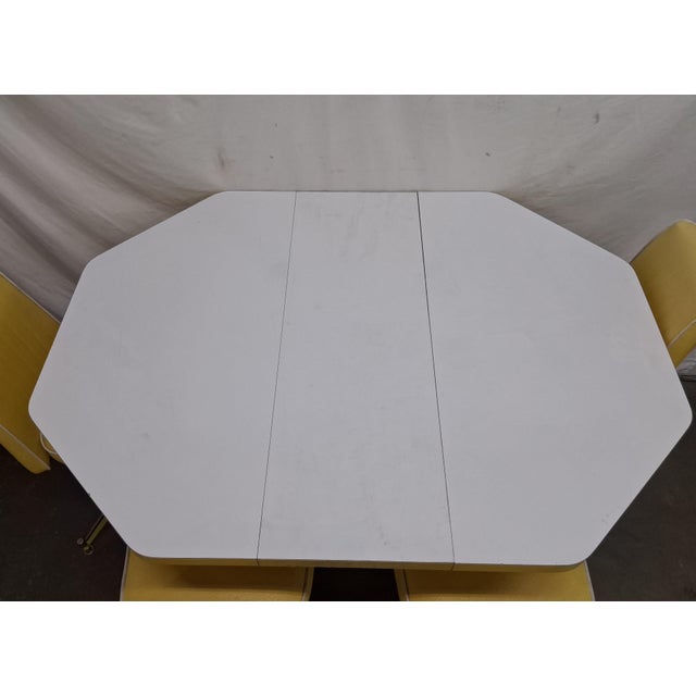 This is a verified mid-century modern masterpiece. We have confirmed this set was manufactured by Acme Chrome Corp. of Los...