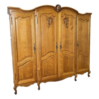 Vintage French Louis XVI Style Wardrobe in Carved Oak For Sale