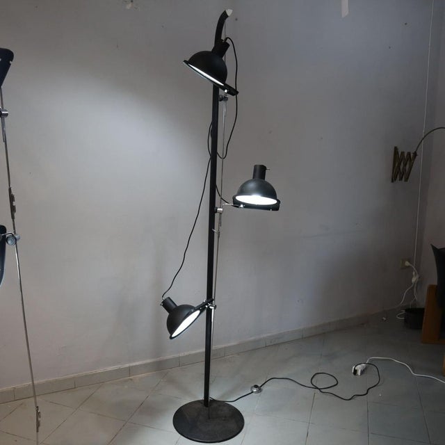 Vintage Floor Lamp Luci mod. 475: Italian Design with Precise Details The Luci mod. 475 floor lamp represents a...