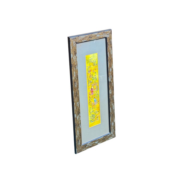 This exquisite vertical wall hanging features a vibrant silk embroidered panel set against a neutral matte, elegantly...