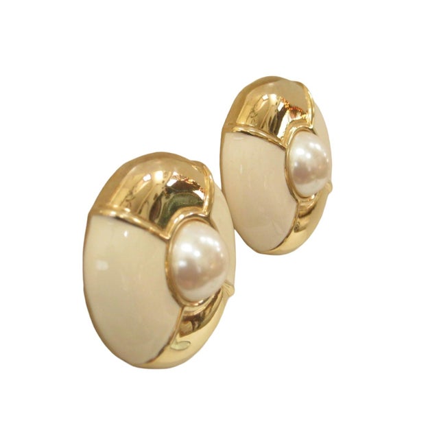 Givenchy 1970s stunning runway large cream enamel & gold plated clip -back earrings Signed, "Givenchy, Paris, New York"...