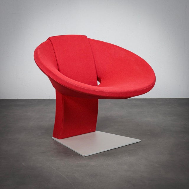 A rare contemporary sculptural lounge chair produced in italy during the 2000s. Defined by its bold circular form and...