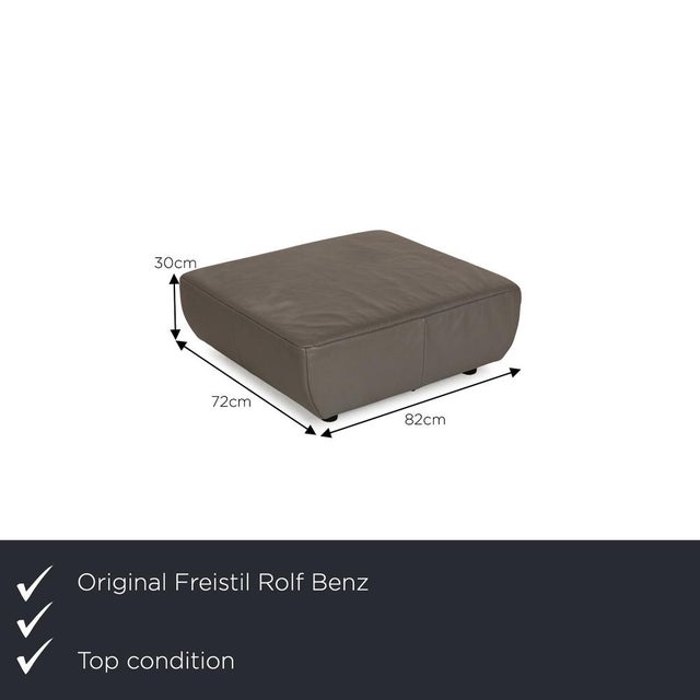 The stool from Freistil Rolf Benz is covered in gray genuine leather and stands on inconspicuous feet. It is characterized...