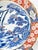 A magnificent and substantial 14-inch Japanese Imari porcelain charger featuring classic auspicious motifs in rich...