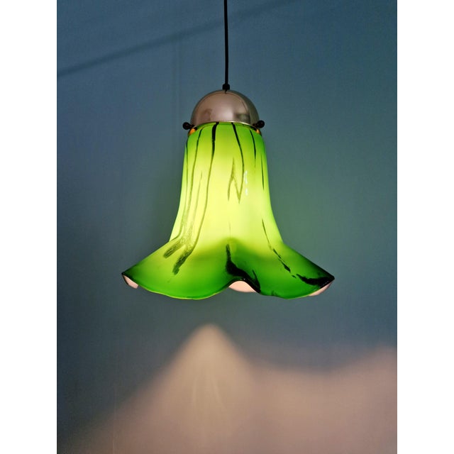 Green marbled opaline glass and brass pendant light, produced by the german manufacturer peill & putzler, 1970s...