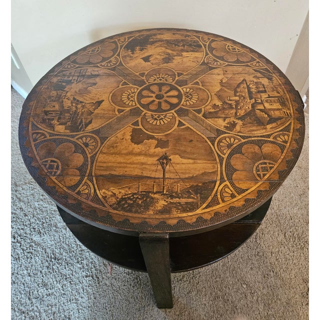 This exquisite Black Forest side table features carved mountain landscape and village scenes. The table retains a rich...