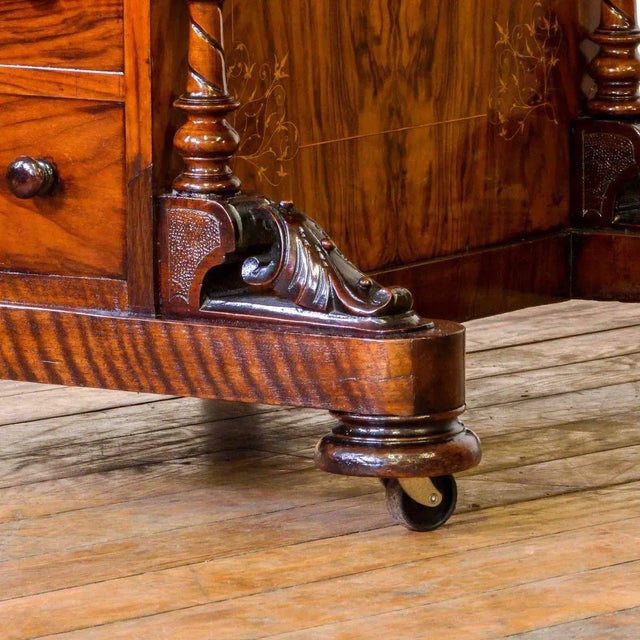 This attractive inlaid burr walnut davenport from the Victorian period features dummy drawers to one side and real working...