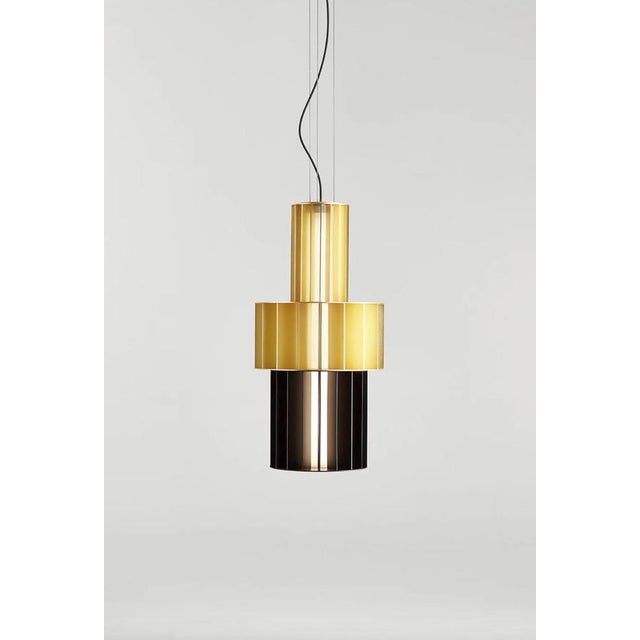 Stephen burks babel t me custom combination suspended lamp for parachilna suspended lamp built using aluminum structures...