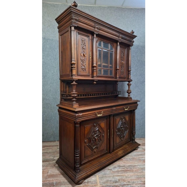 Richly carved two-piece buffet – henri ii style in walnut important two-piece buffet in solid wood, in the henri ii style,...