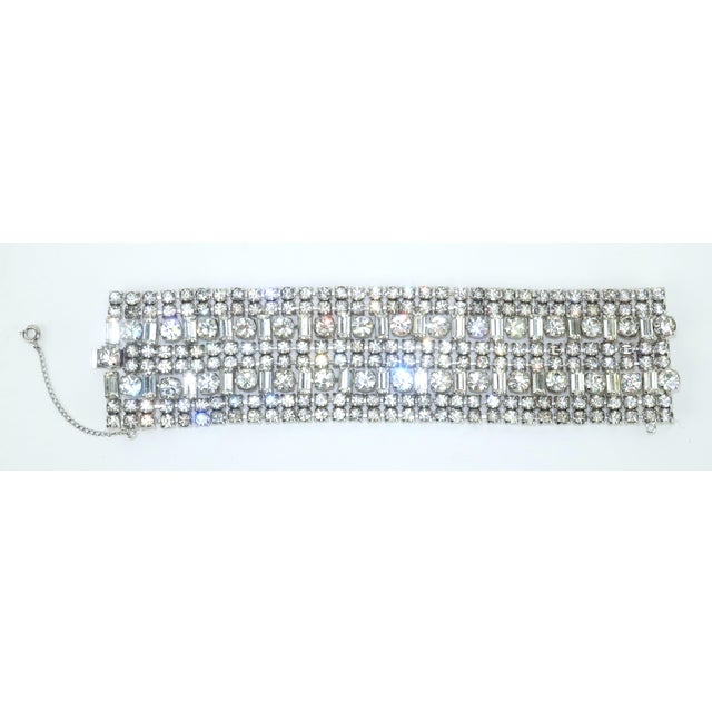 Chunky, charming and oh so fabulous! 1950's crystal rhinestone link bracelet consisting of eight rows of sparkling...