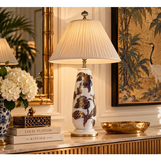 Elegant vintage 1960s German porcelain table lamp by Heinrich & Co., featuring a beautiful tapered silhouette adorned with...