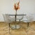 A Lovely Vintage, Round Granite & Chrome Dining Table, in the style of Eero Saarinen’s Tulip Table, circa 1970s. The table...