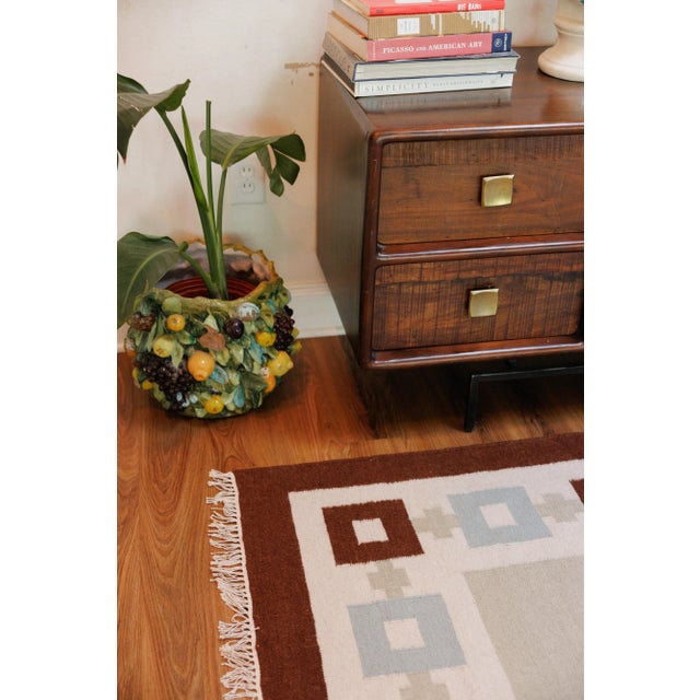 The versatile Chain Rug was inspired by vintage enamel jewelry and designed with a Scandinavian sensibility. Thoughtful...