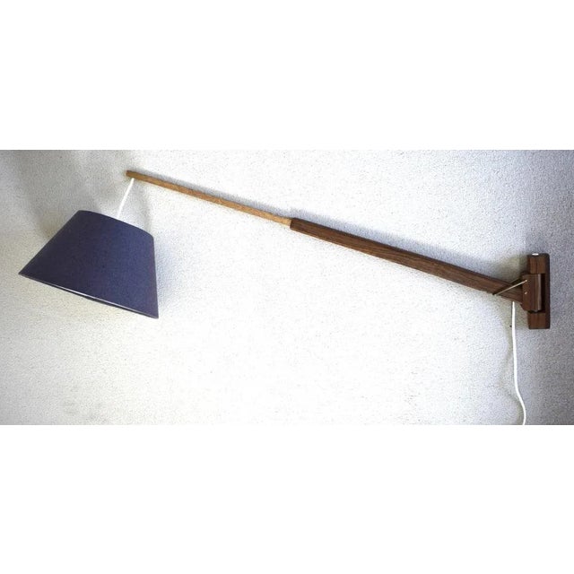 Danish teak wall lamp: 3 height adjustable, swiveling, extendable. Max. length 100 cm European Plug (up to 250V).The...
