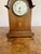 Antique Edwardian quality mahogany inlaid mantle clock having a quality mahogany inlaid case with a shaped top above a...